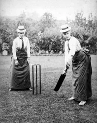 Women Playing Cricket